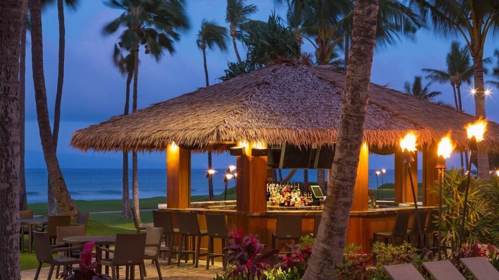 bar with ocean view at night 